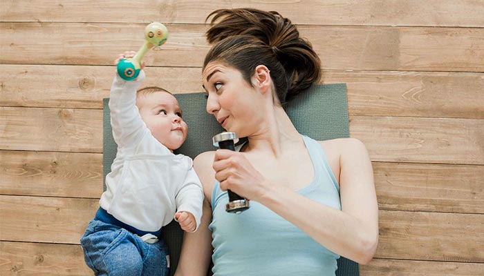 mother exercising with baby