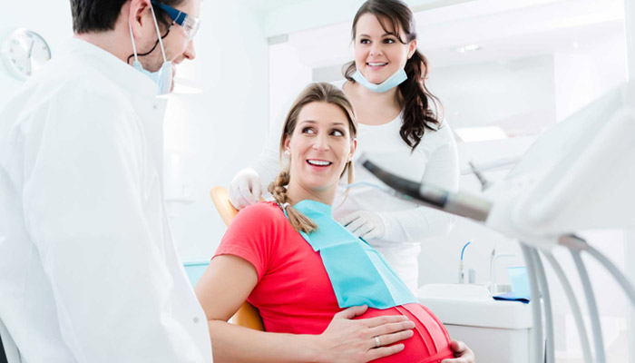 pregnant woman at dentist